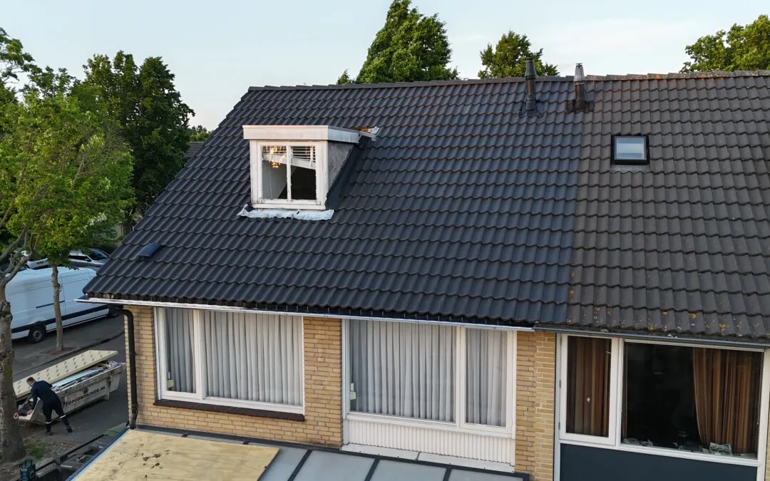 Na: nieuw antraciet pannendak met dakkapel in Eindhoven